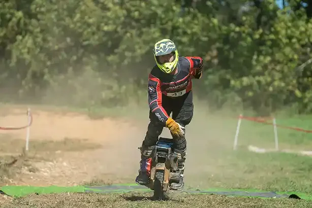 Joshua Fagerness crosses the finish line on the Flow Track at Amped 2025