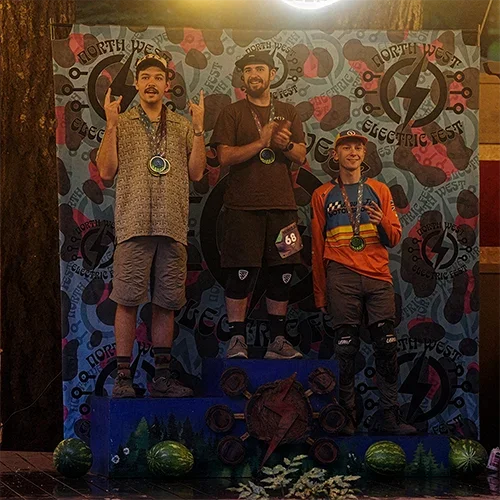Cameron Patecell, Jack Minsker and Kai Peterson on the Mens Pro Onewheel podium at Northwest Electric Fest 2026